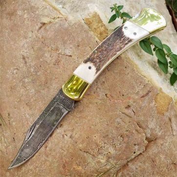 经典巴克110锻打型大马士革刃